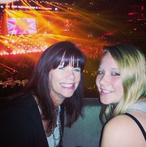 mom and daughter at concert