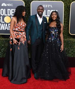 idris elba with daughter and fiance at golden globes red carpet